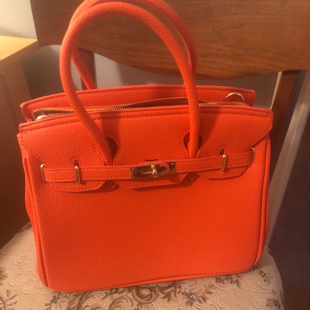 Beautiful brand new handbag .